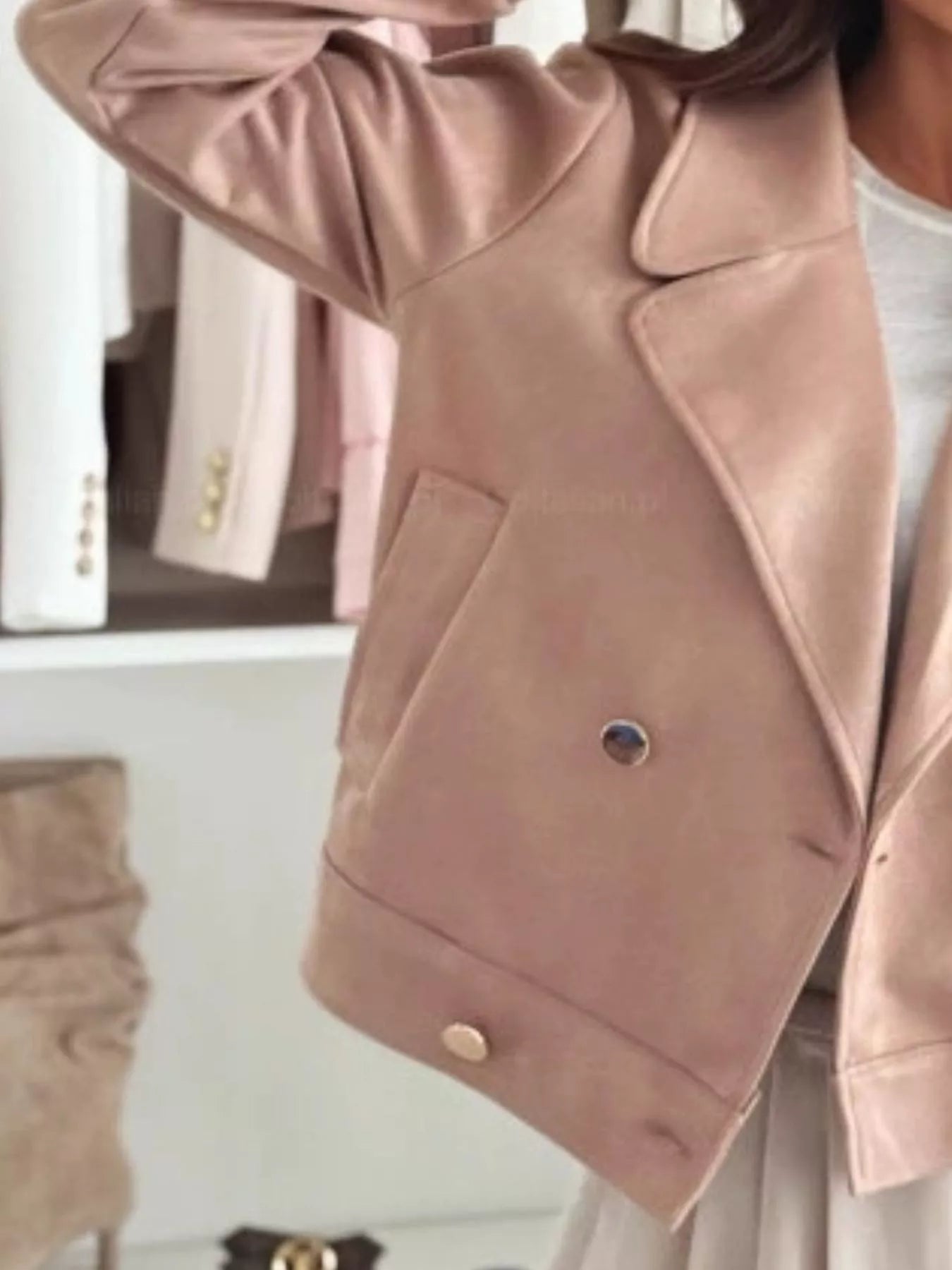Dusty pink cropped double-breasted jacket with gold buttons and flap pocket at hem
