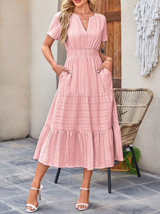 Pink tiered midi dress, short sleeves, V notched neckline, gathered waist