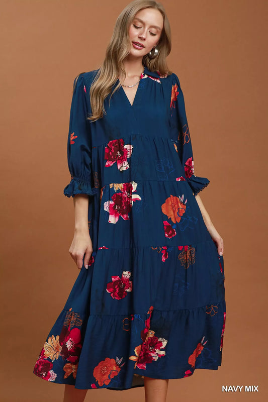 Tiered navy midi dress with red floral print and puff sleeves, V-neck