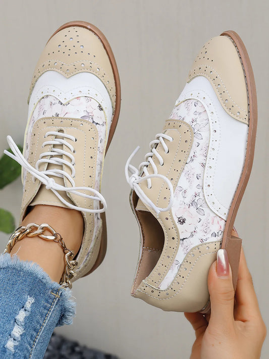 Khaki lace-up round-toe sneakers with stitched brogue detail