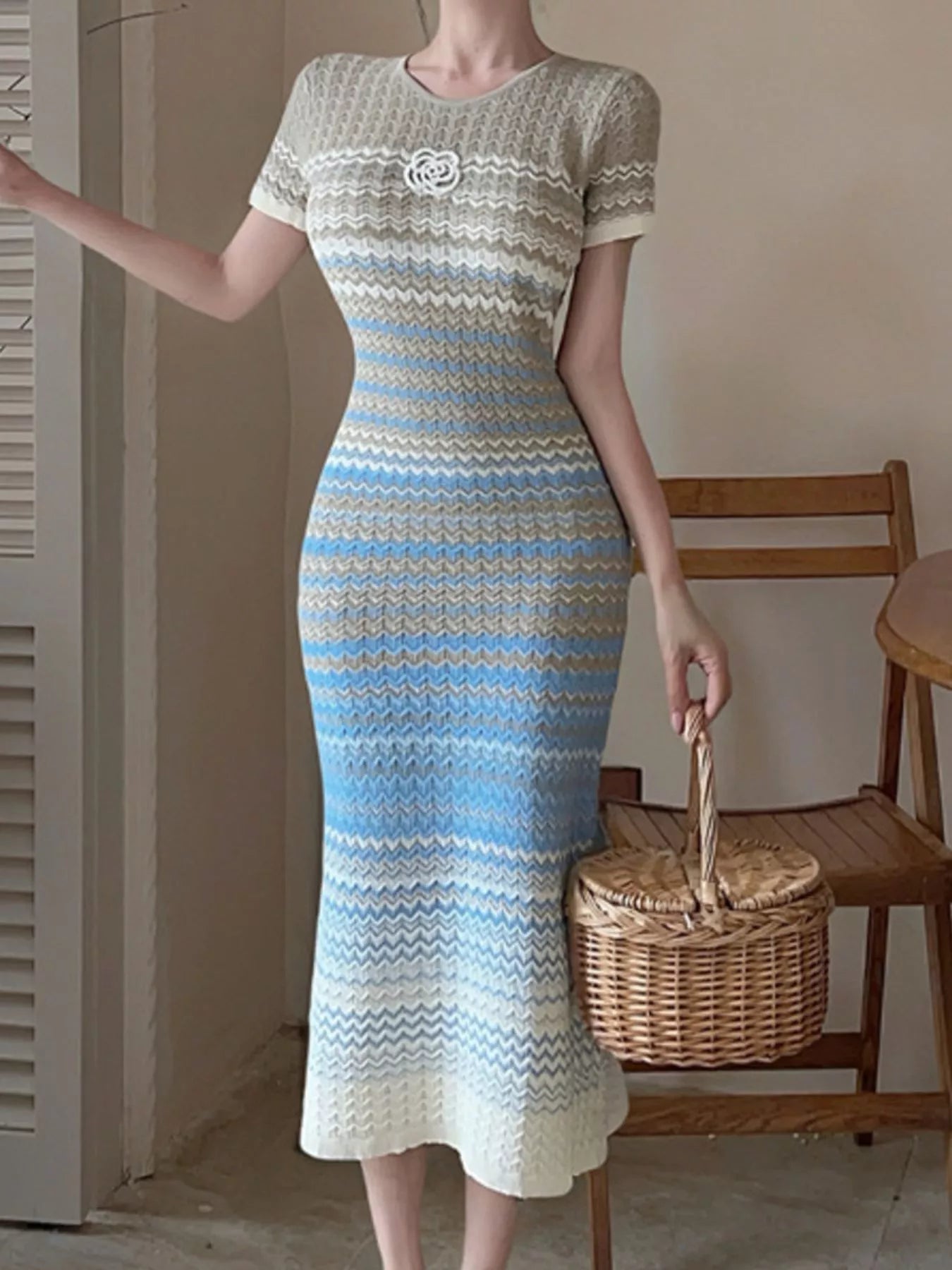 Light blue and cream chevron knit midi dress with short sleeves and round neckline
