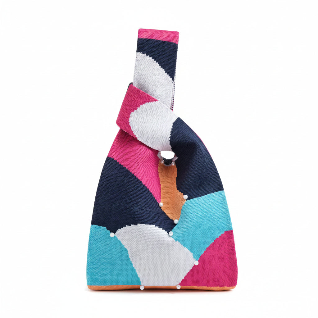Knot wrist bag with multicolor geometric print and beaded embellishments