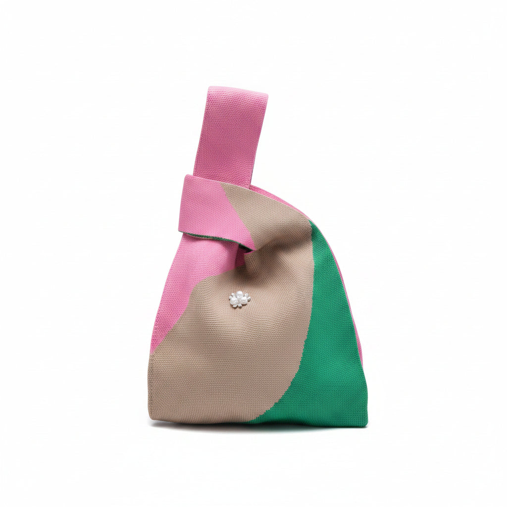 Knot wrist bag in pink, beige, and green with small flower bead embellishment