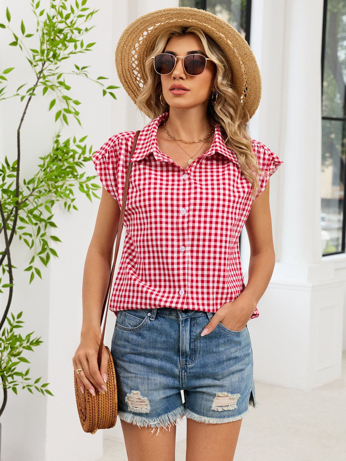 Red and white plaid cap sleeve shirt with collar and button front