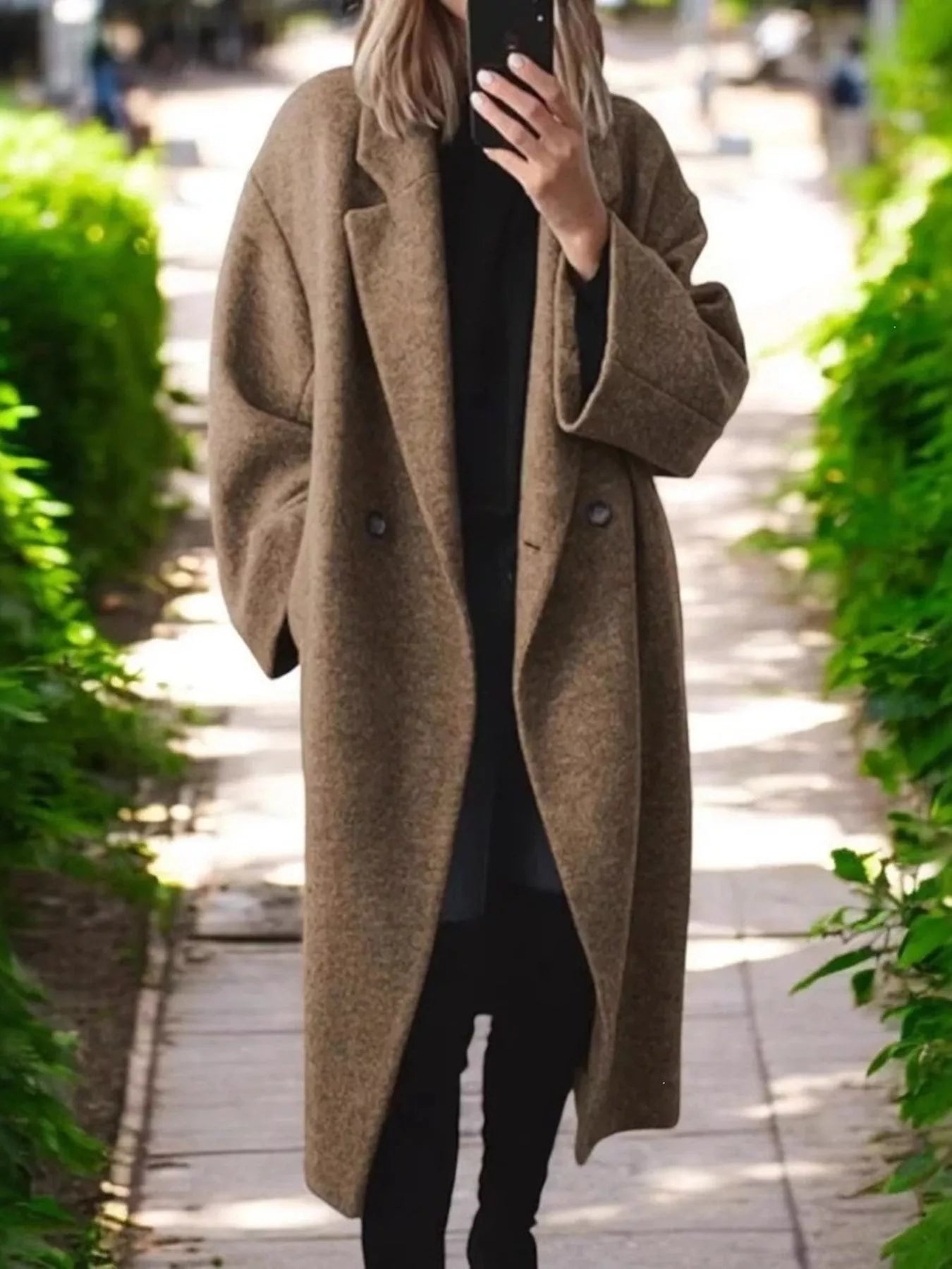 Brown longline wool-blend coat with notch lapels and double-breasted button front