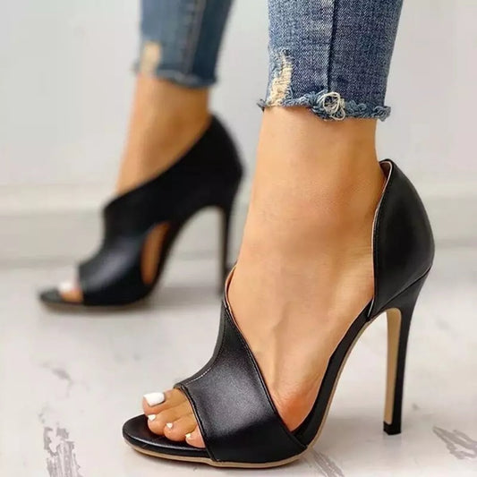 Black open-toe stiletto heeled sandals with slim high heel, side profile
