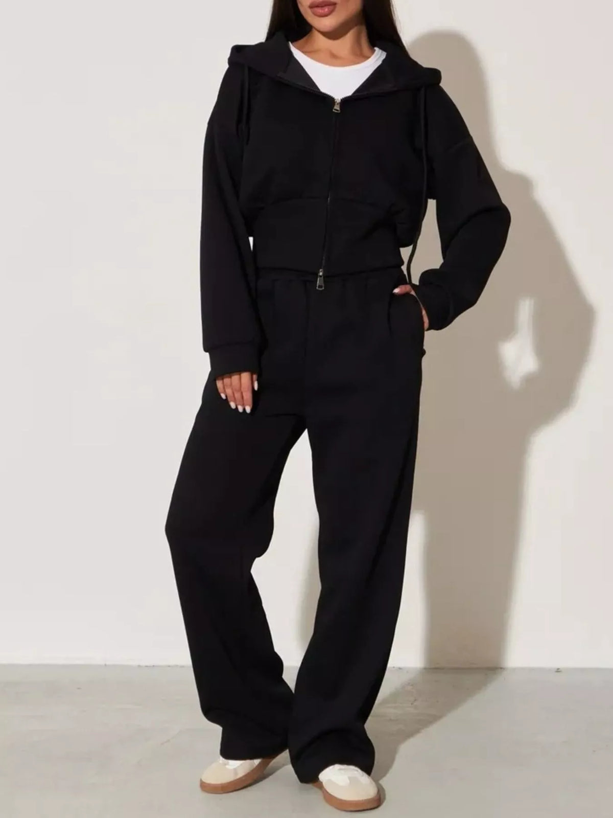 Black zip-up hoodie and wide-leg pants set with hood, front zipper, relaxed fit