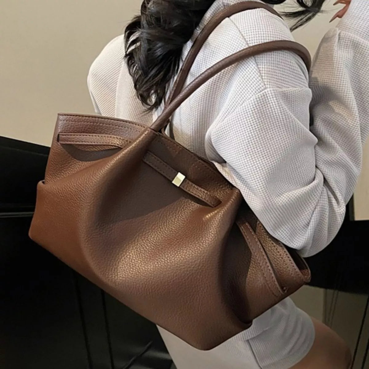 PU leather shoulder bag in brown with wide top handles and structured front pocket