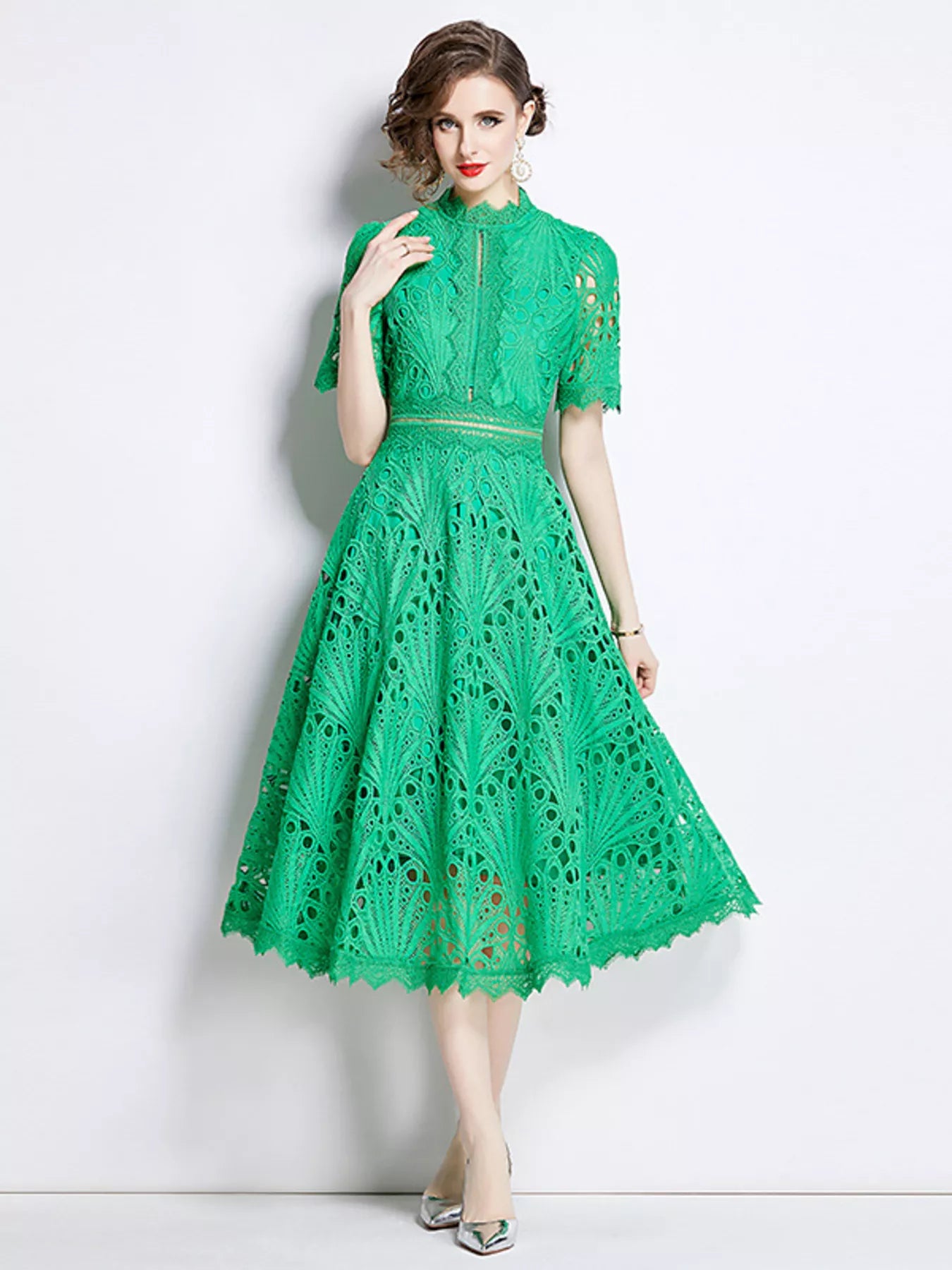 Green lace midi dress with short sleeves, scalloped eyelet pattern, cinched waist