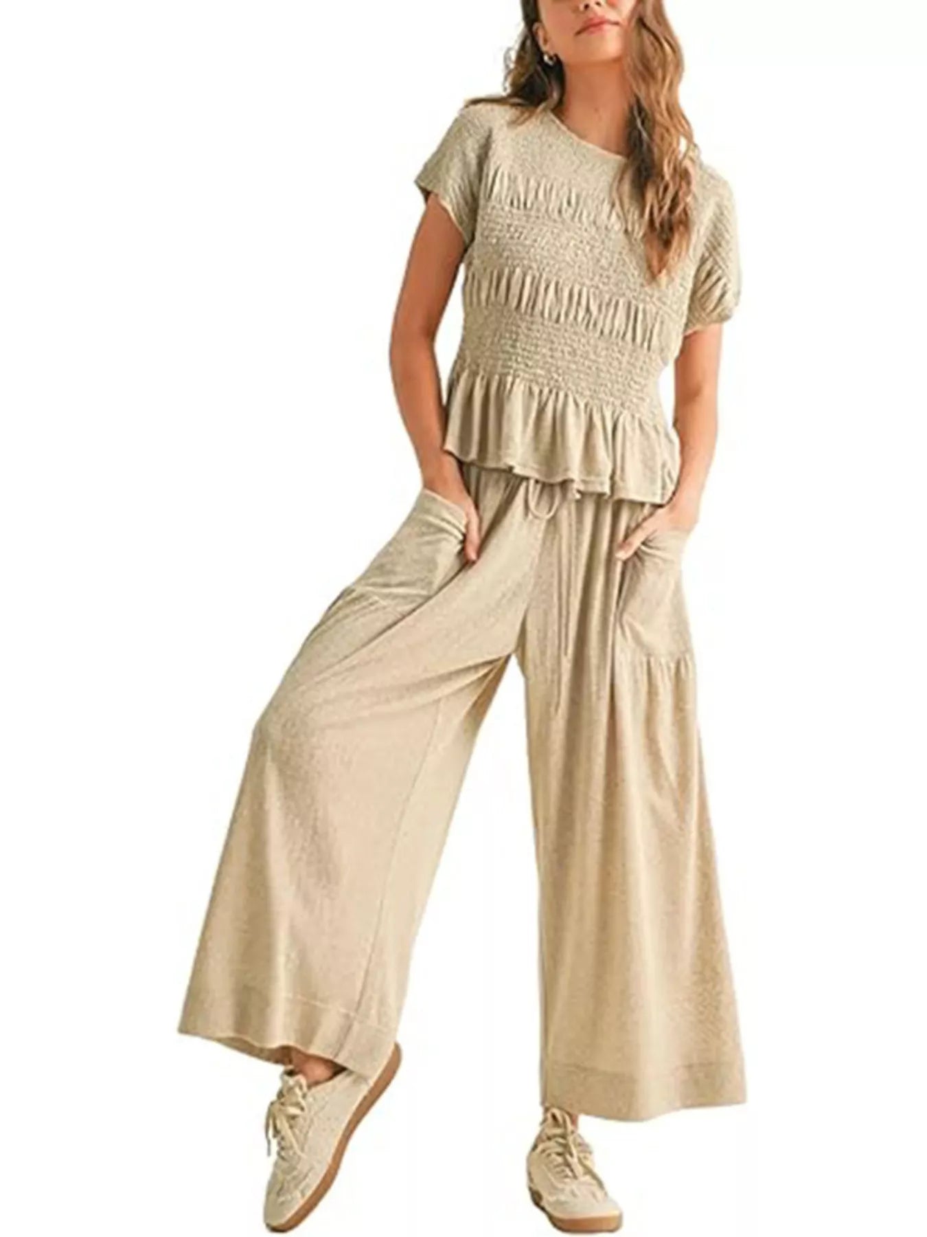 Cream smocked peplum top and wide-leg pants set with tiered ruffle peplum and drawstring waist