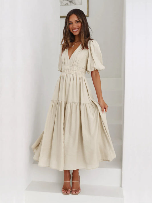 Beige tiered surplice midi dress with puff half sleeves and V-neck