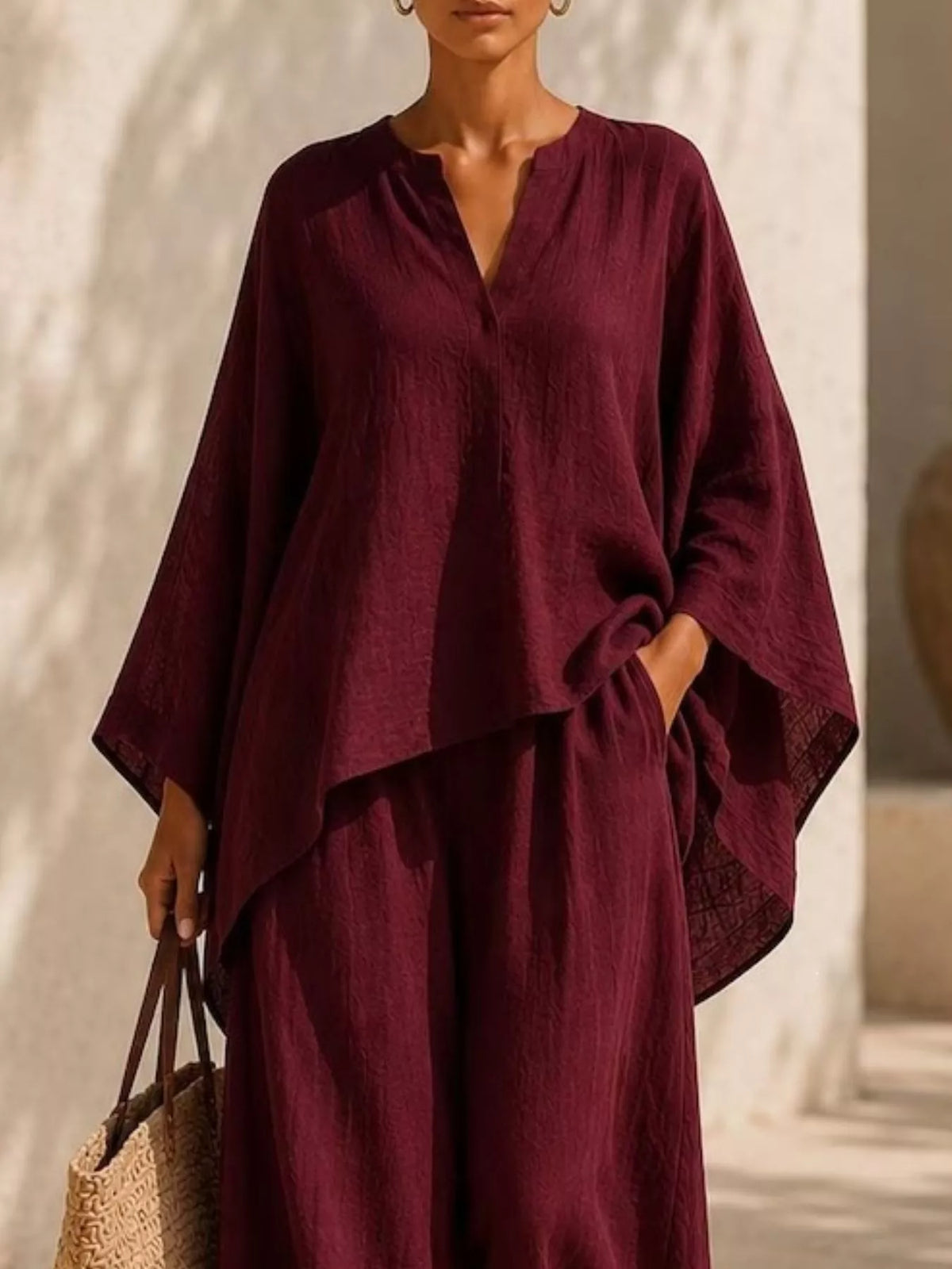 Burgundy long-sleeve V-neck top and wide-leg pants set, draped sleeves with tie