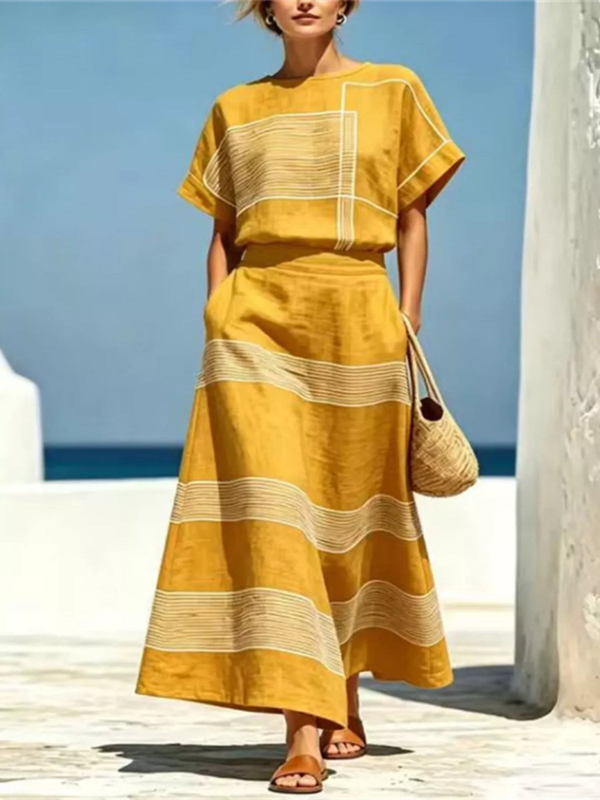 Plus size striped round-neck top and flared midi skirt set in gold