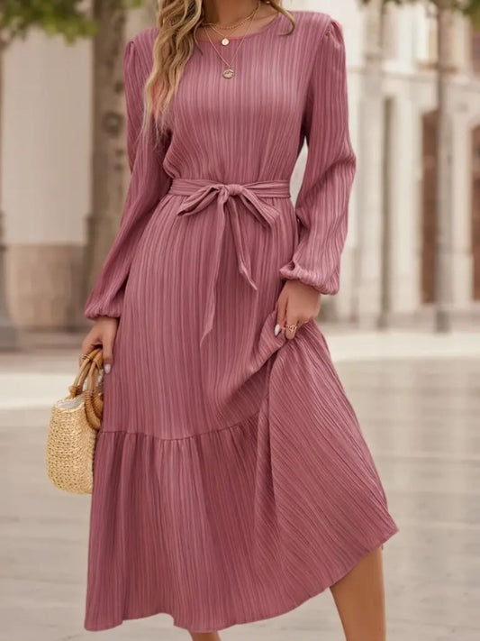 Dusty rose tie-waist tiered midi dress with long puff sleeves and textured fabric