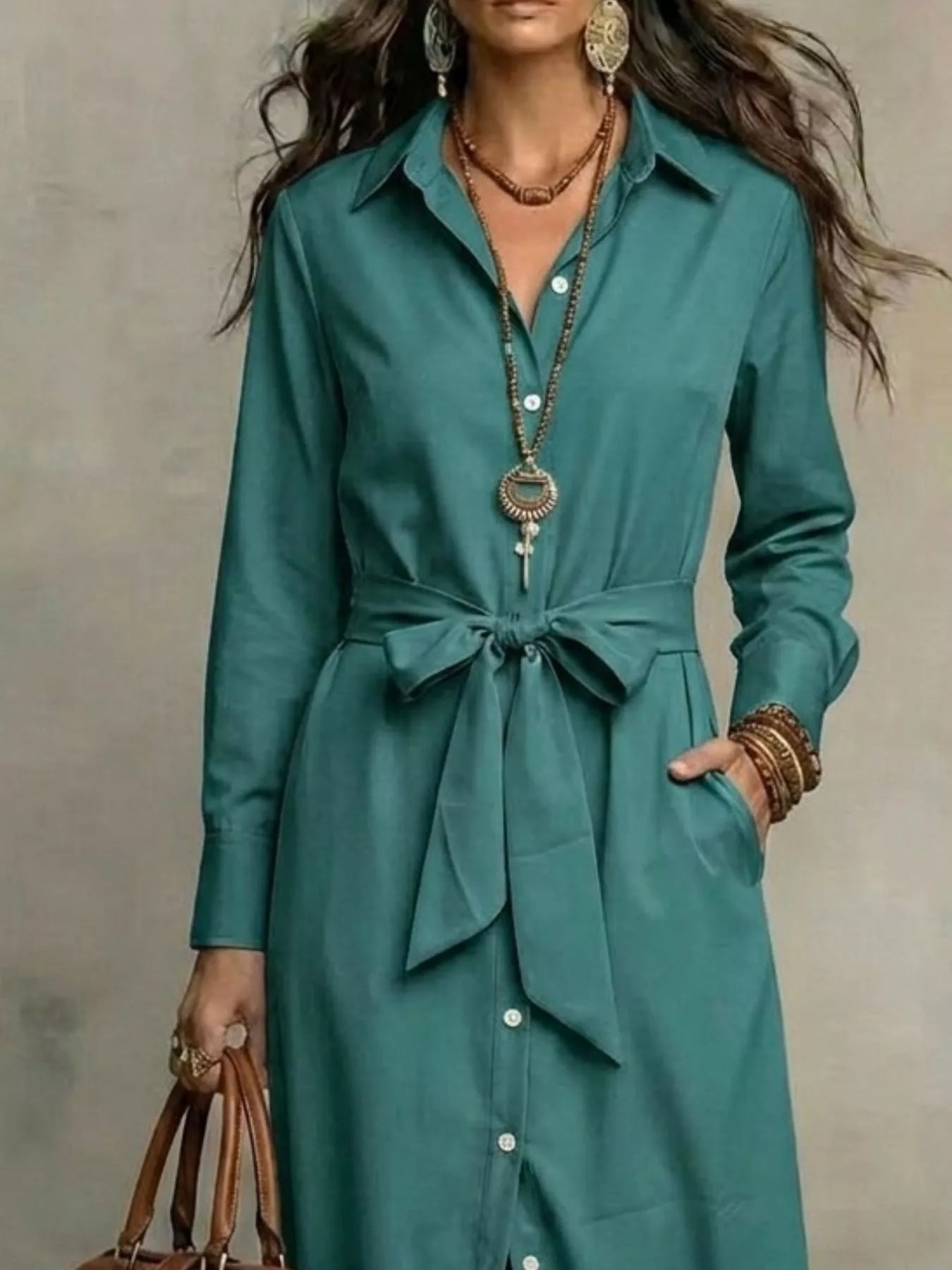 Plus size teal long-sleeve shirt dress with gathered tie waist and buttons