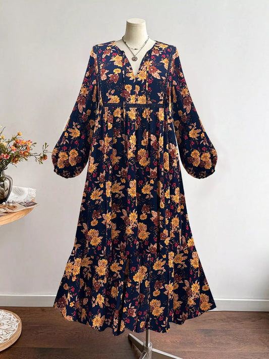 Plus size floral tie-neck dress, gathered waist and tiered skirt, dark base