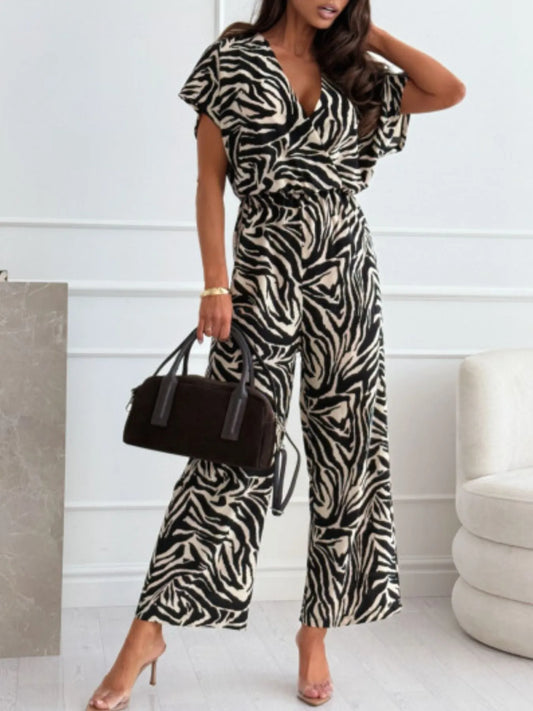 Zebra-print wide-leg jumpsuit with V-neck and ruched waist