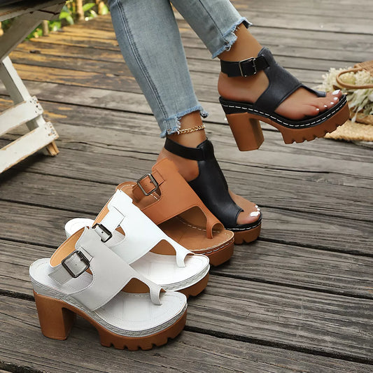 Black toe-loop block heel sandals with two buckled straps and chunky platform sole