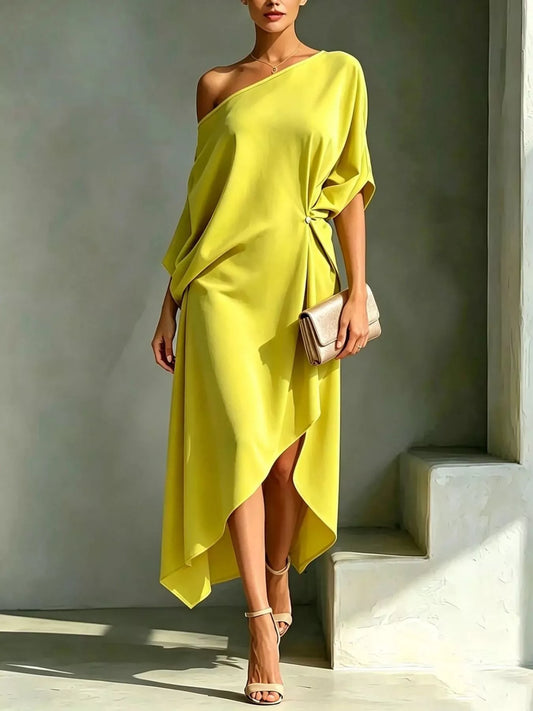 Asymmetrical one-shoulder drape dress in yellow, draped front with side slit, midi length