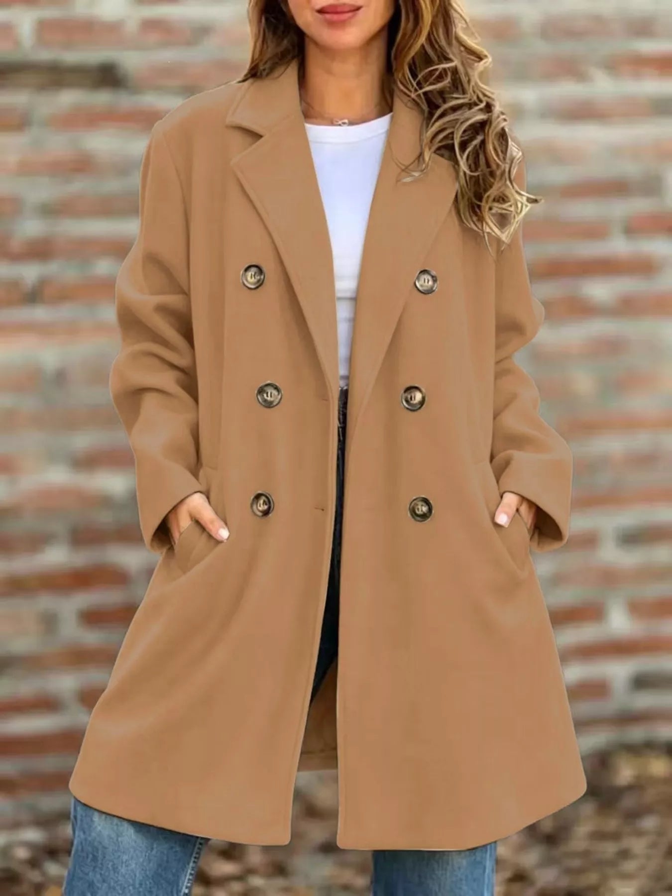Double-breasted lapel coat in camel tan with gold button placket and long sleeves