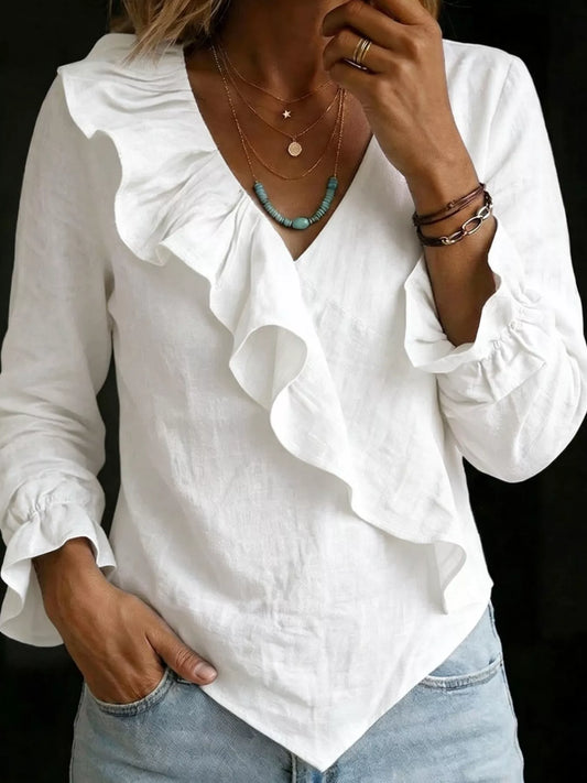 White ruffled long-sleeve blouse with layered V-neck front