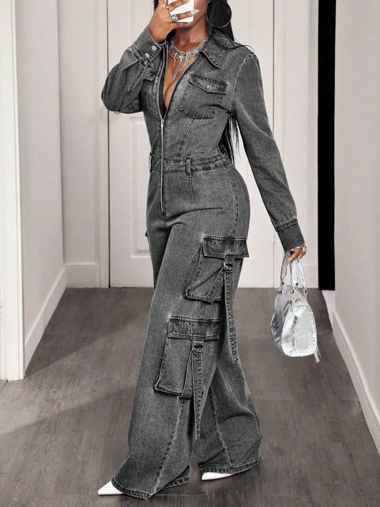 Gray denim zip-front cargo jumpsuit with wide legs and chest-to-calf utility pockets