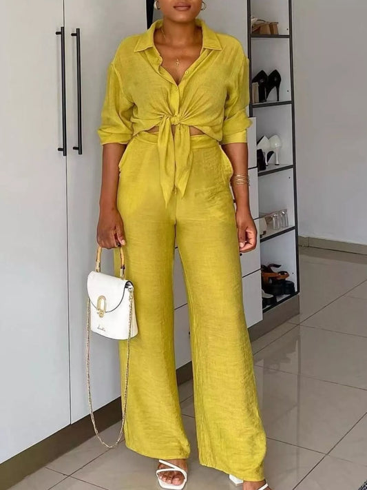 Yellow tie-front top and wide-leg pants set, 3/4 sleeves, V-neck, tied waist.