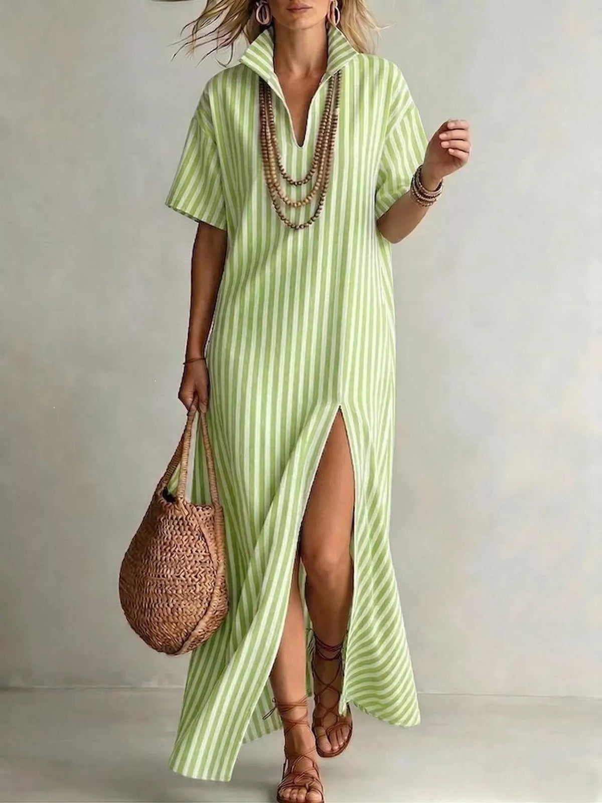 Green striped maxi dress with short sleeves, V-neck, high side slit hem