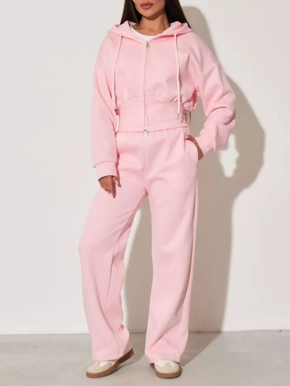 Pink zip-up hoodie and wide-leg pants set with hood, drawstring waist, and relaxed wide legs