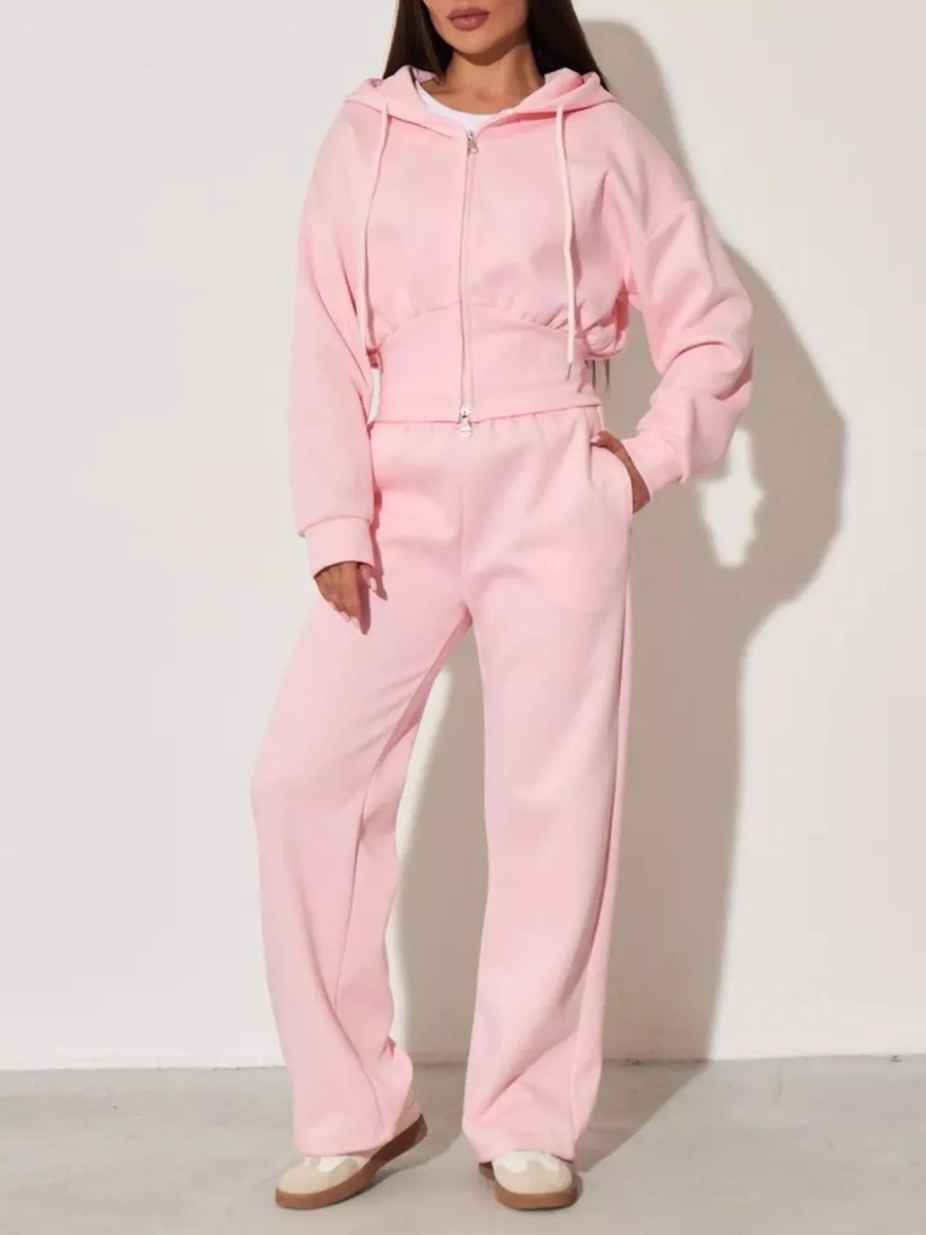 Pink zip-up hoodie and wide-leg pants set with hood, drawstring waist, and relaxed wide legs