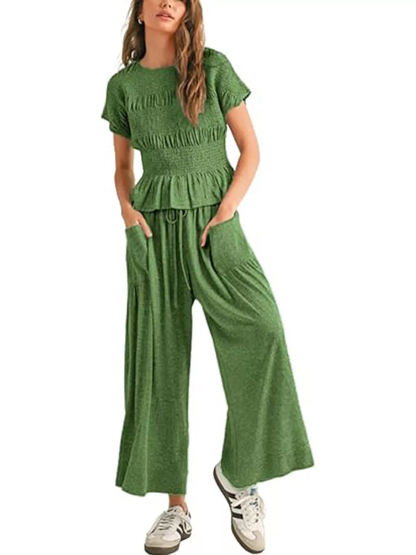 Green smocked peplum top and wide-leg pants set, short sleeves, tiered peplum.