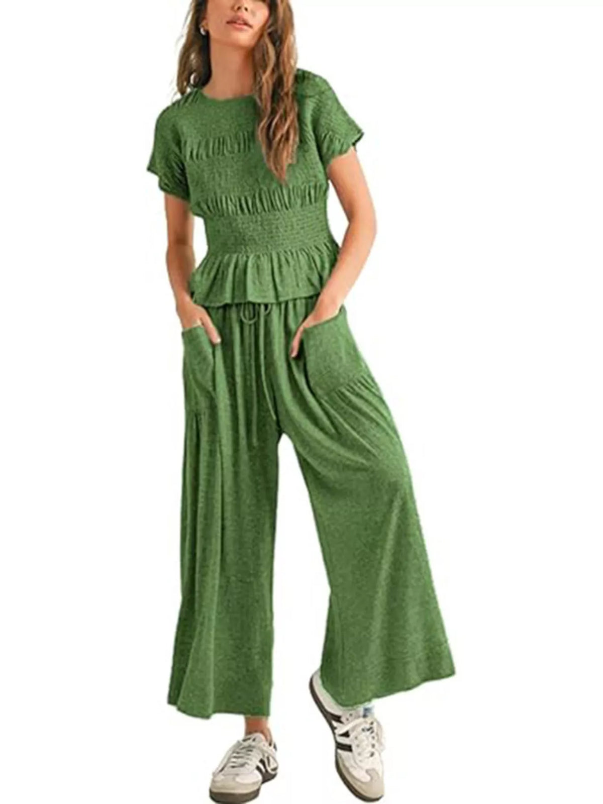 Green smocked peplum top and wide-leg pants set, short sleeves, tiered peplum.