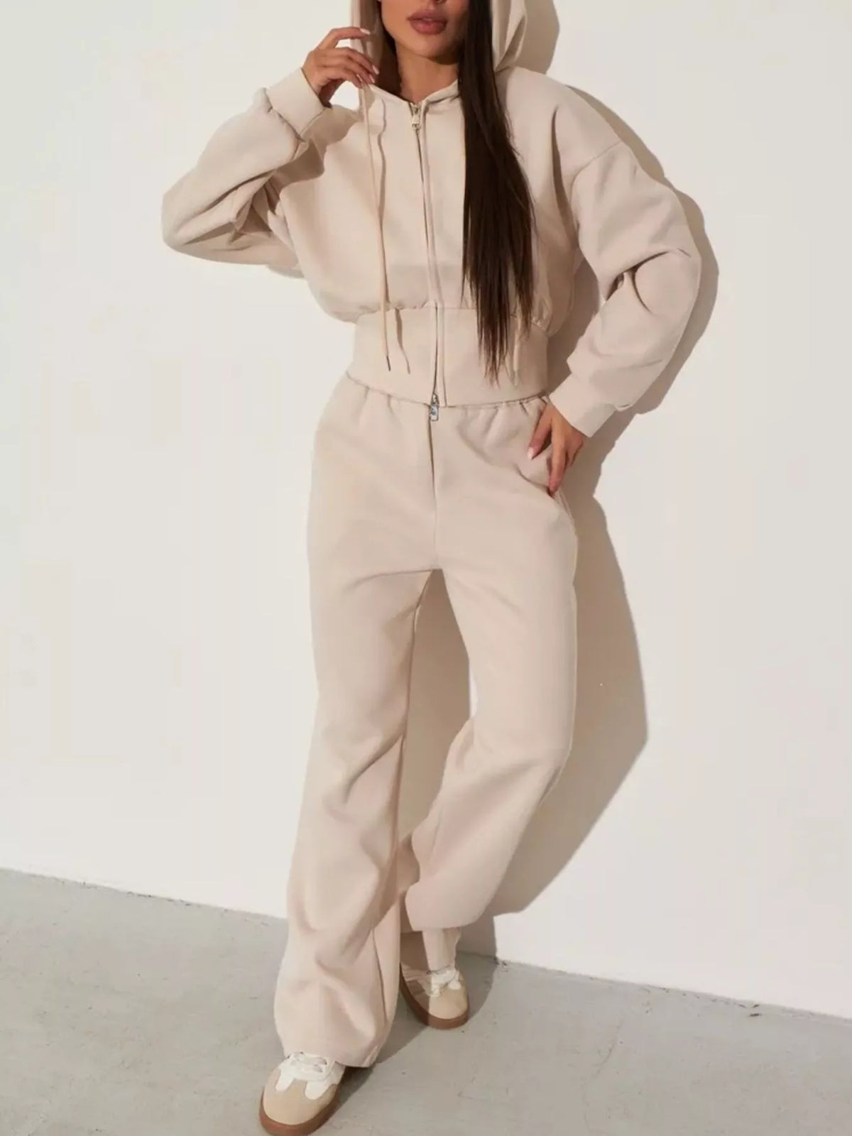 Light apricot zip-up hoodie and wide-leg pants set, standing pose, drawstring waistband