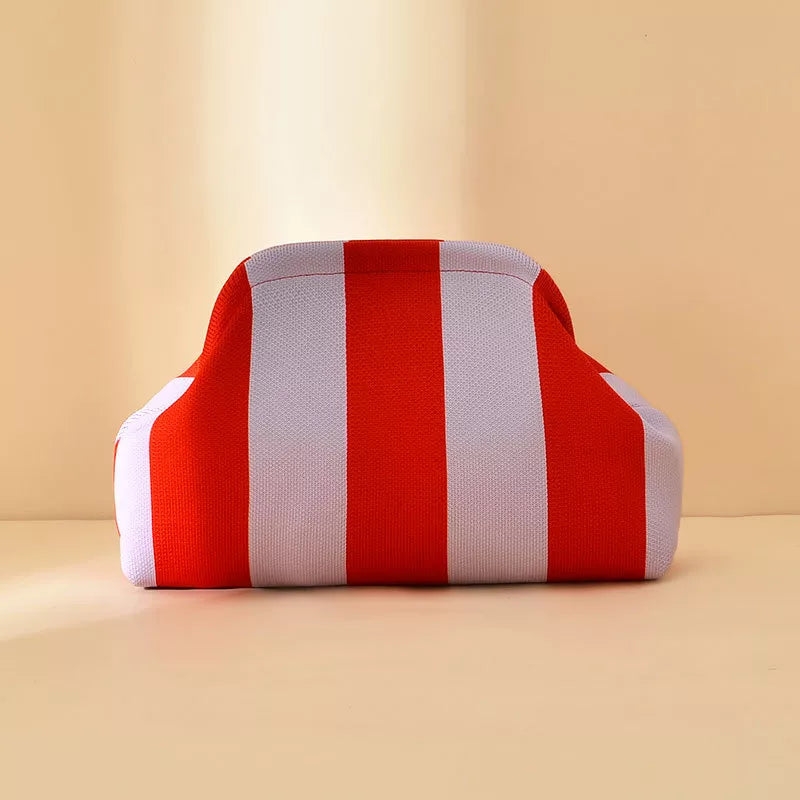 Red and white striped portable clutch with rounded edges
