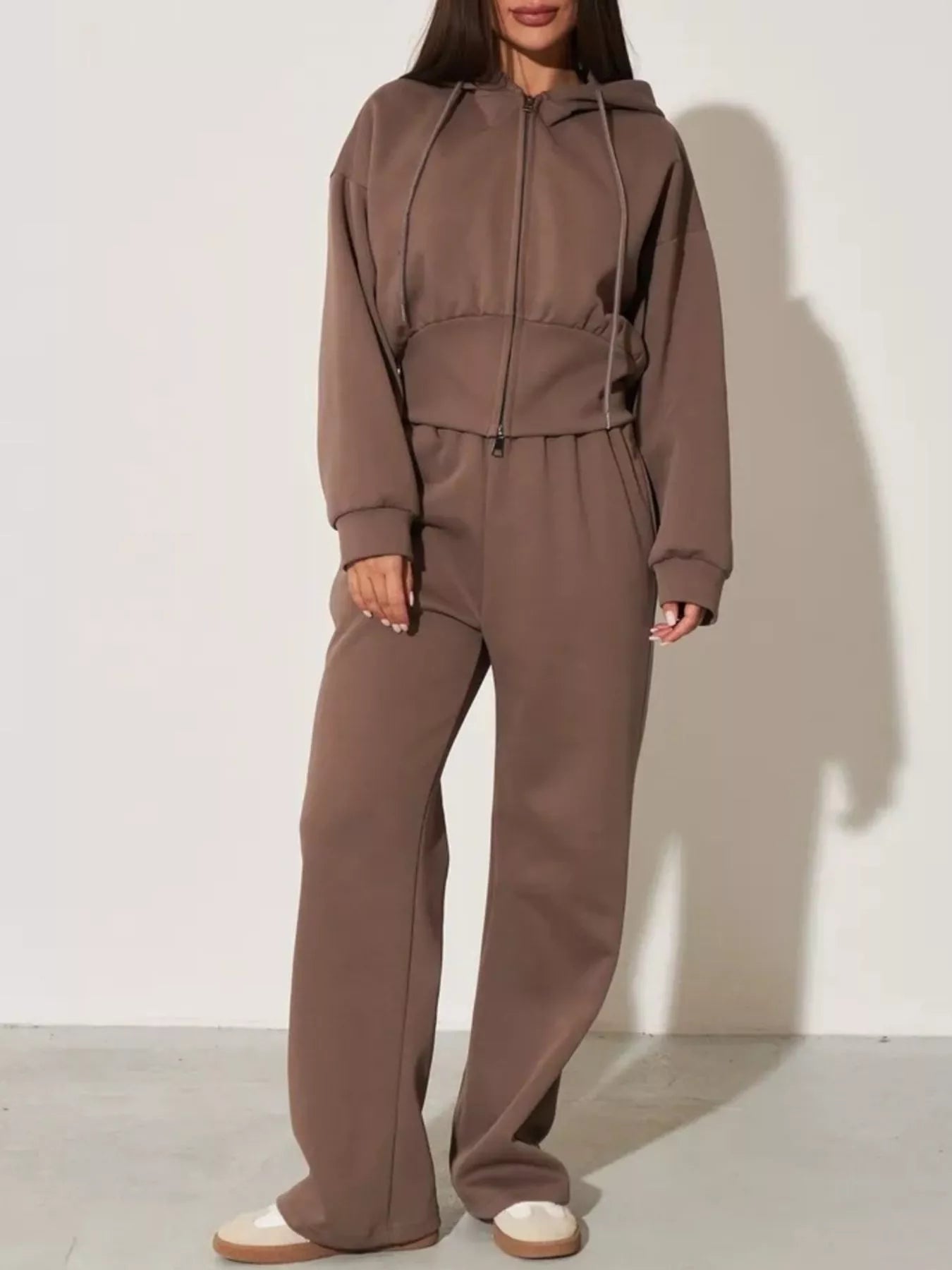 Brown zip-up hoodie and wide-leg pants set with hood, drawstring waist, and full-length zip