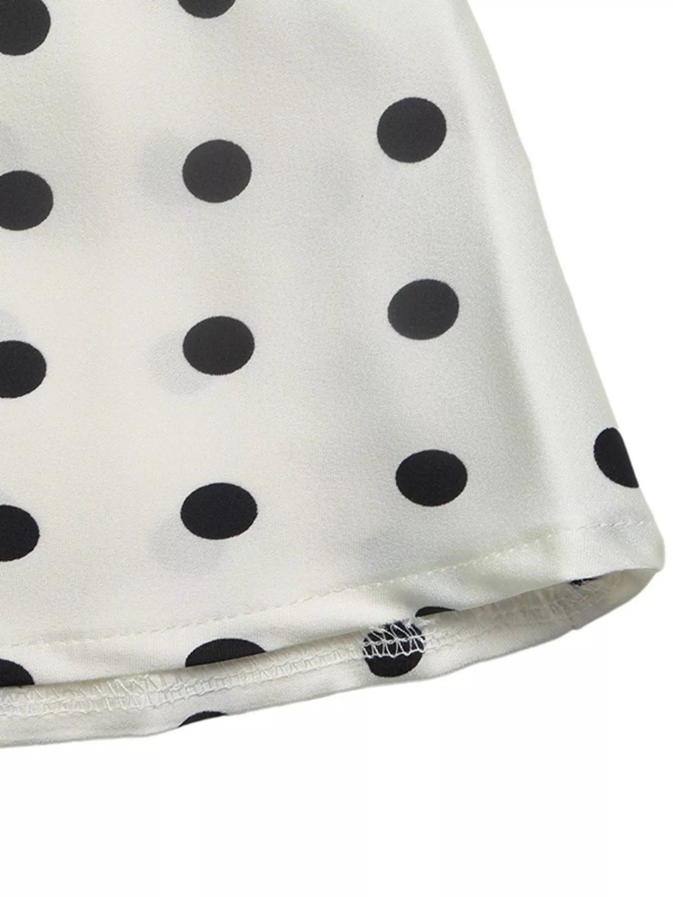 Beige midi skirt with black polka dots and scalloped hem edge