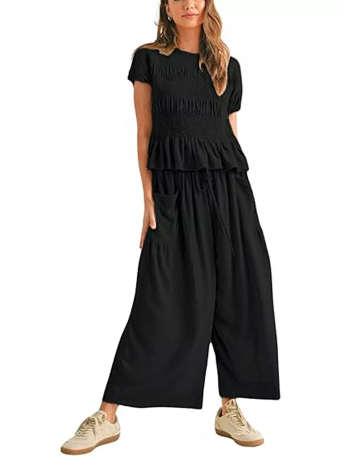 Black smocked peplum top and wide-leg pants set with tiered ruffle peplum and drawstring waist