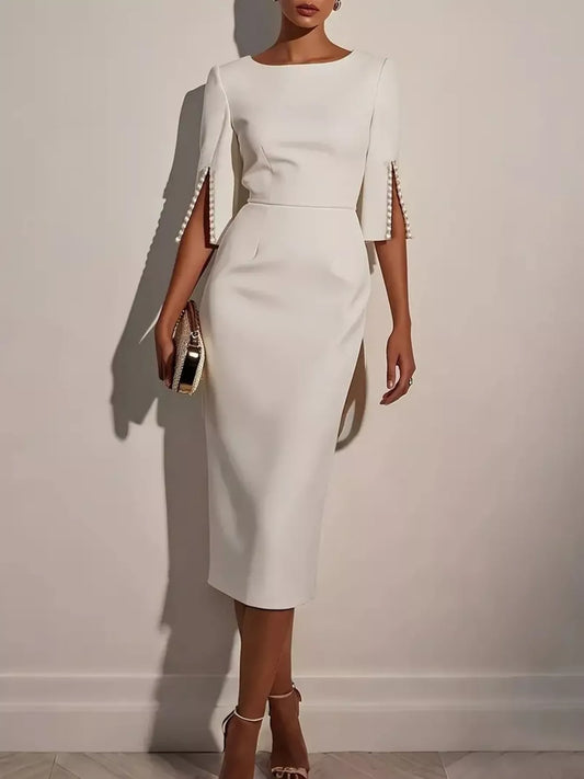 Slim-fit white midi dress with beaded slit cuffs and fitted pencil silhouette
