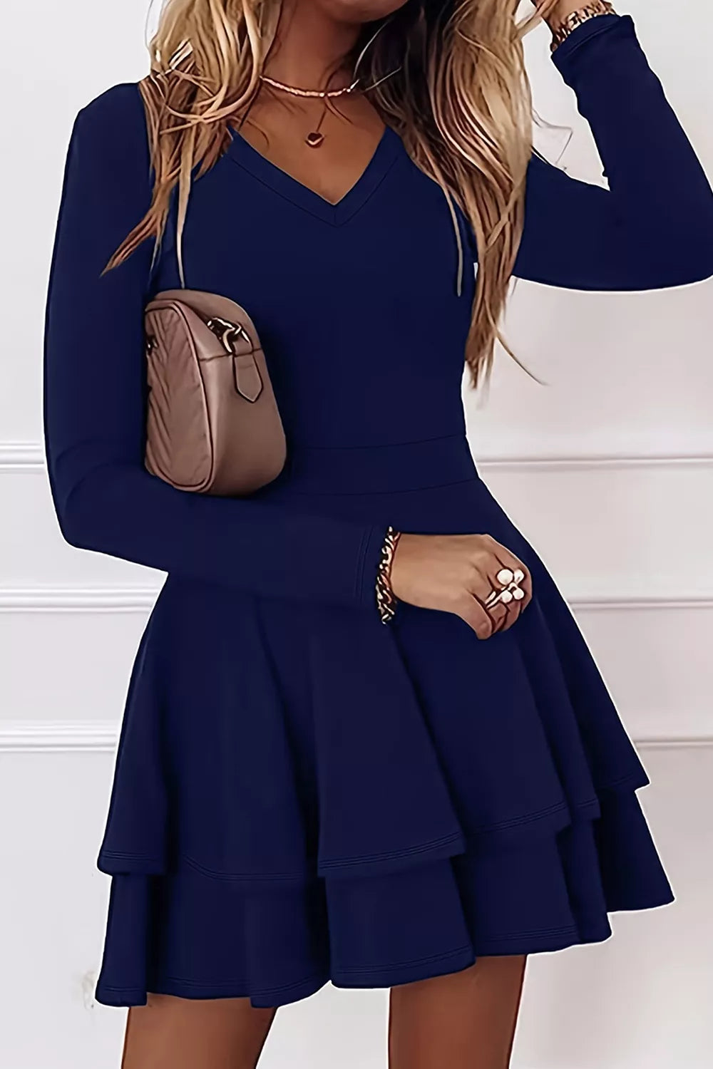 Dark navy long-sleeve V-neck mini dress with flared layered tiers