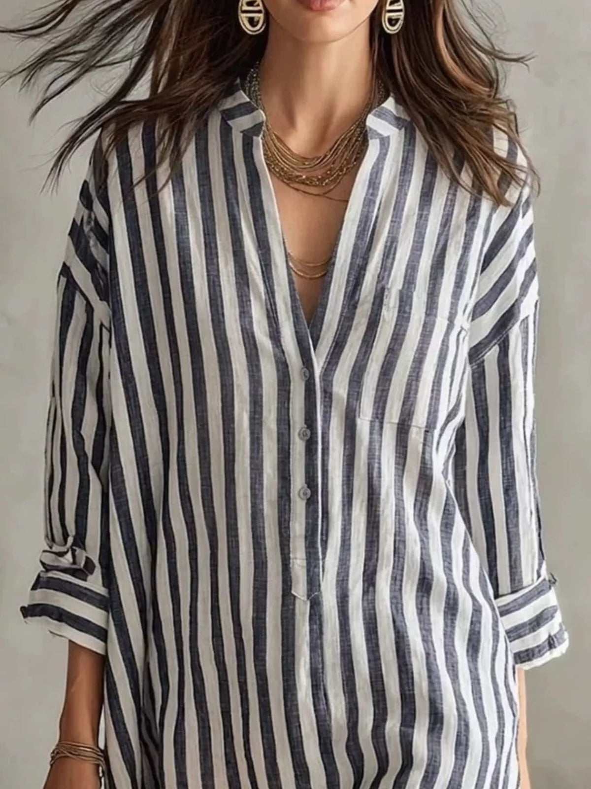 Black-and-white striped shirt dress, V-neck button front, 3/4 sleeves, front patch pocket