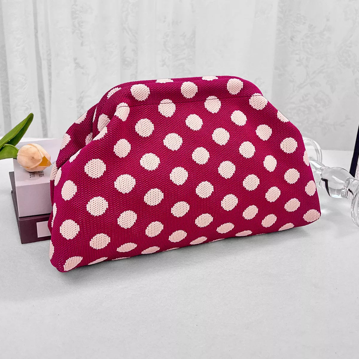 Red knit polka-dot clutch with rounded top