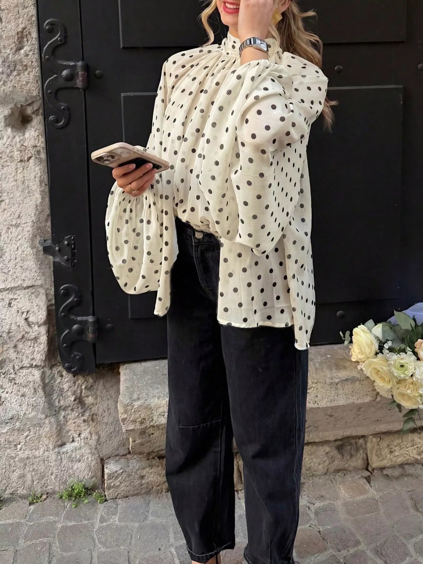Ivory polka-dot balloon-sleeve blouse with high neckline and loose fit