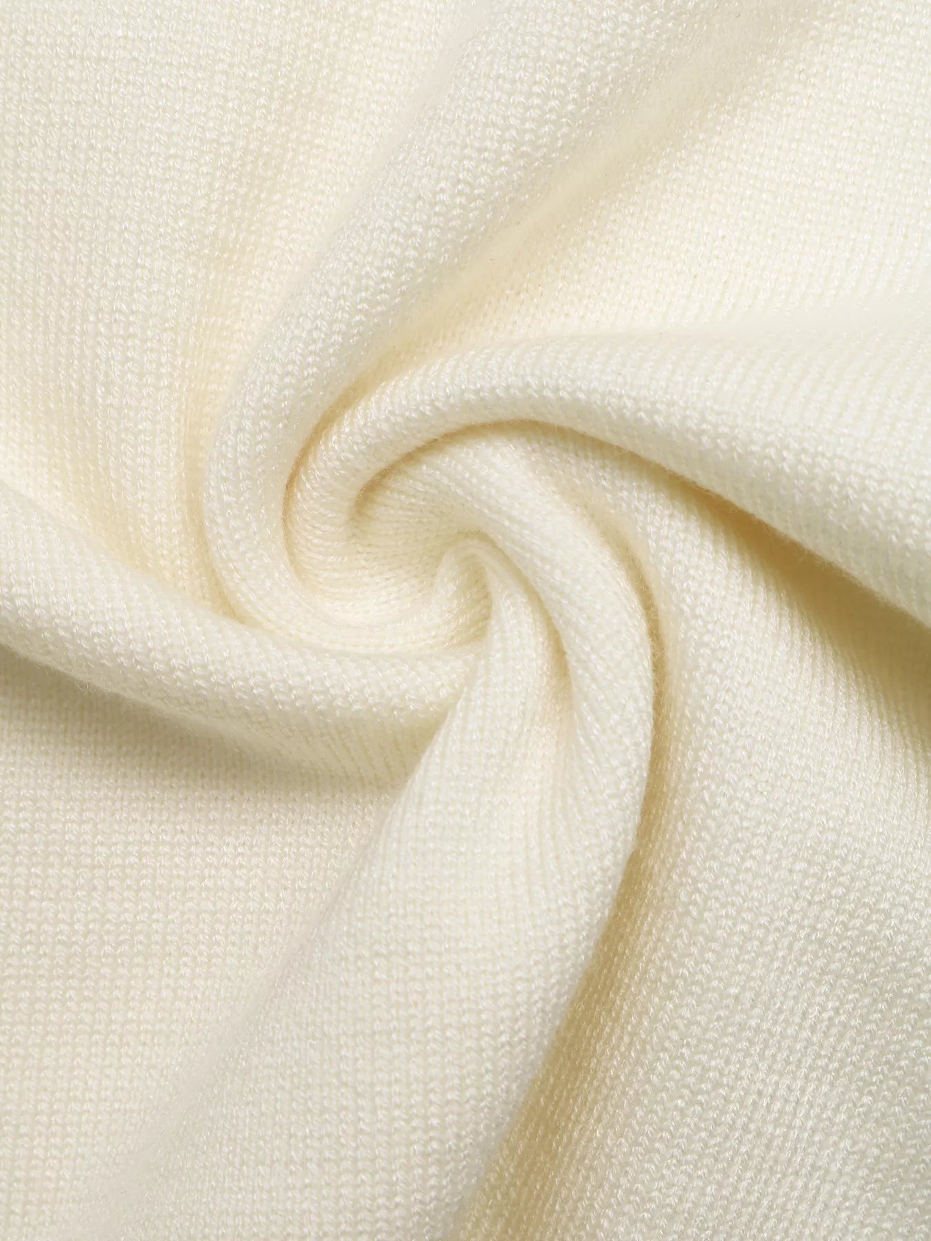 Light apricot textured knit fabric close-up