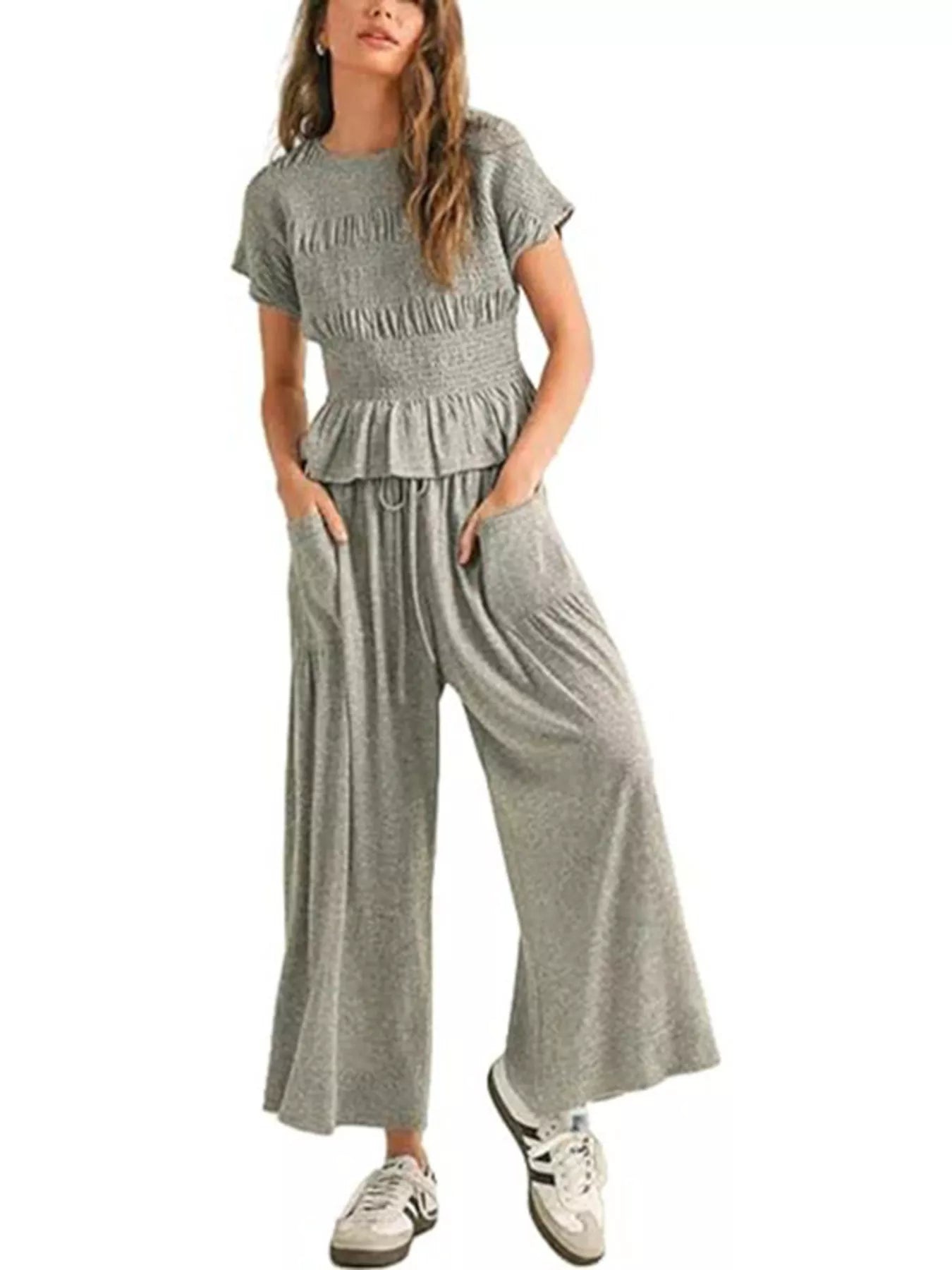 Grey smocked peplum top and wide-leg pants set with ruffled tiers and drawstring waist