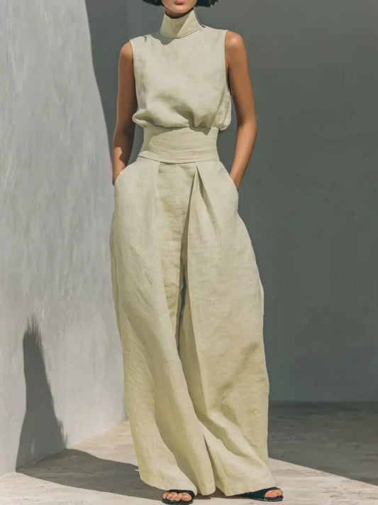 Light yellow sleeveless turtleneck top with knotted waist and wide-leg pants set