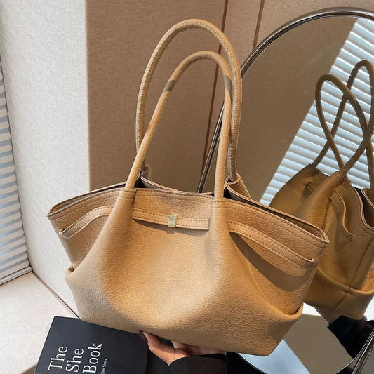 PU leather shoulder bag in khaki beige with top handles and zippered opening