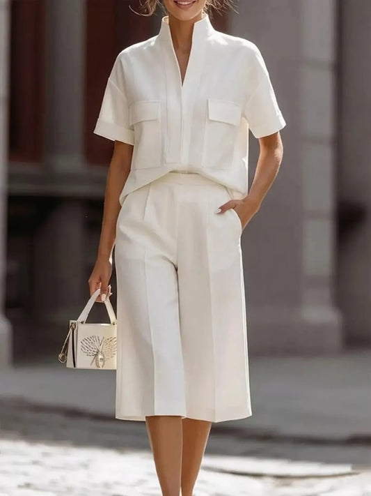 White short-sleeve top and knee shorts set with chest pockets, button-front