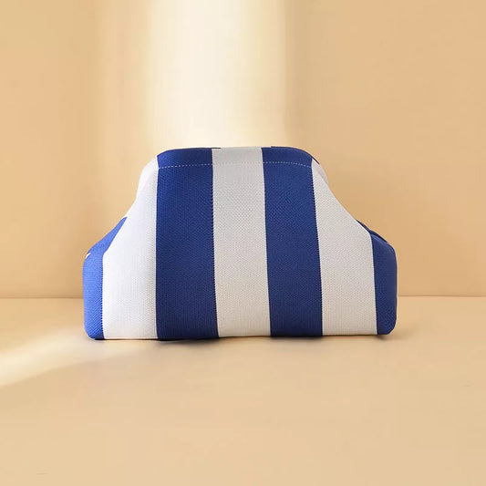 Blue and white striped portable clutch with rounded top edges