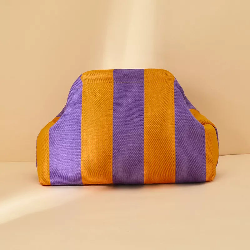 Orange and purple striped portable clutch with rounded edges