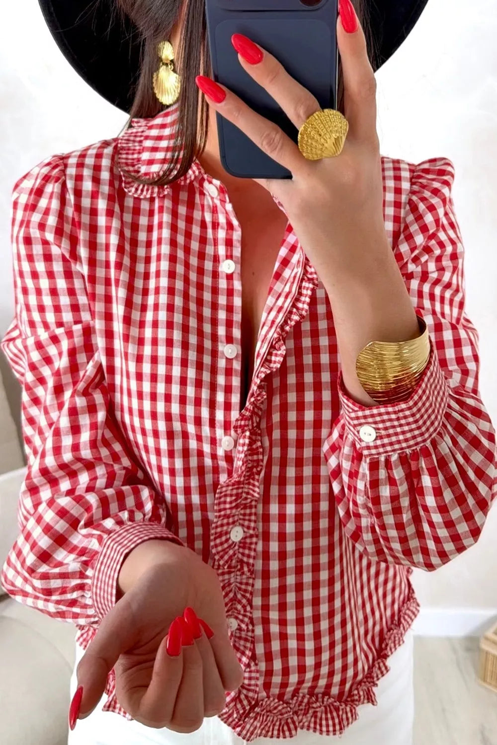 Pink and white plaid long-sleeve button-down shirt with ruffled placket detail